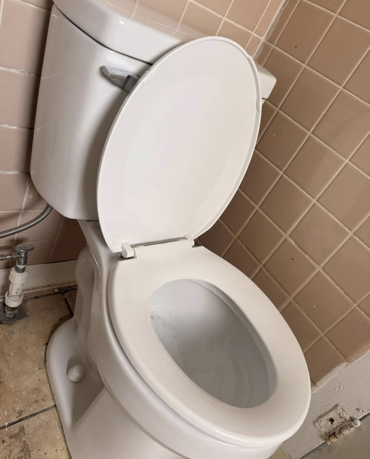 Toilet after post renovation clean in Aurora, ON