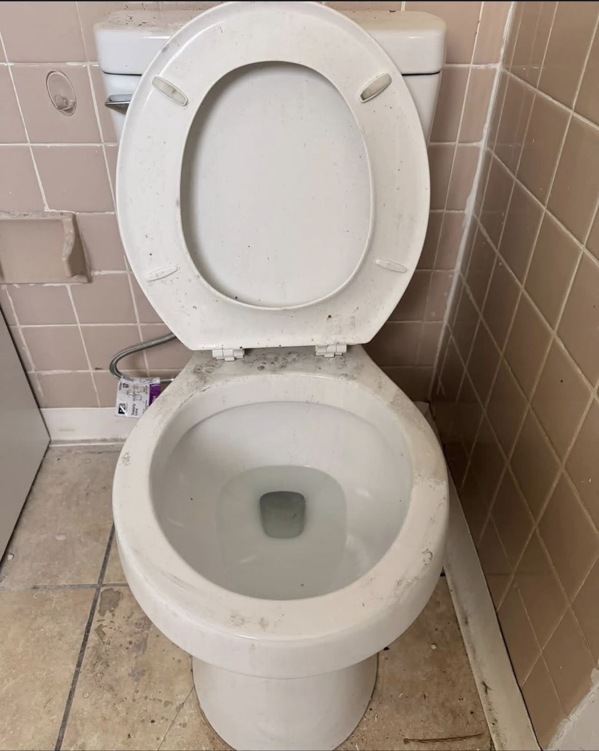 Toilet before post renovation clean in Aurora, ON