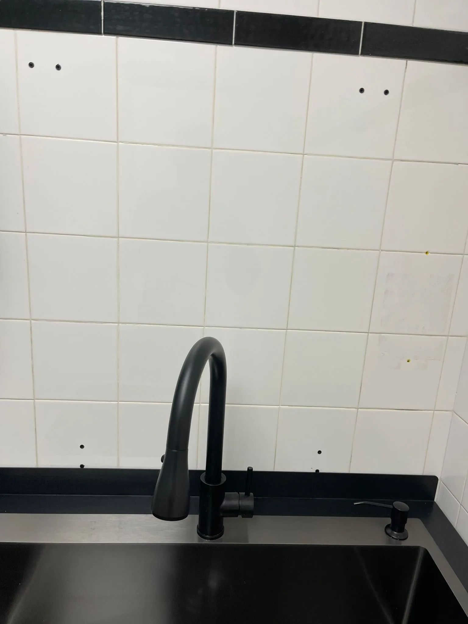 Mayfair Team after commercial cleaning of wall