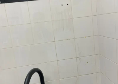 Mayfair team before commercial cleaning wall