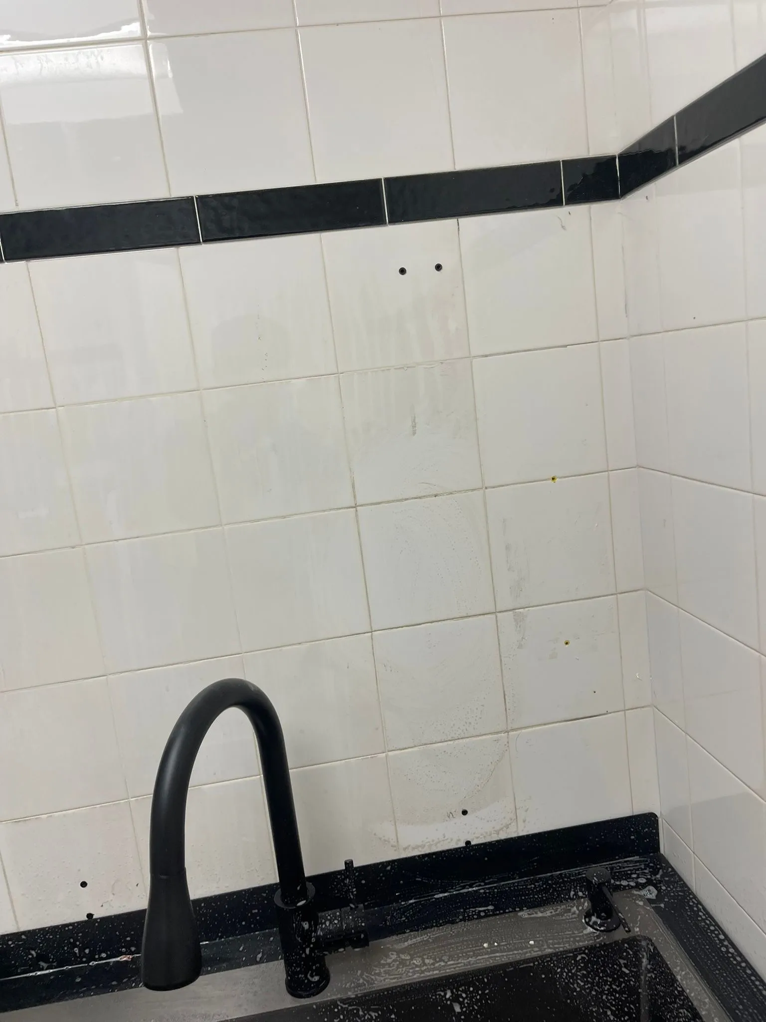 Mayfair team before commercial cleaning wall
